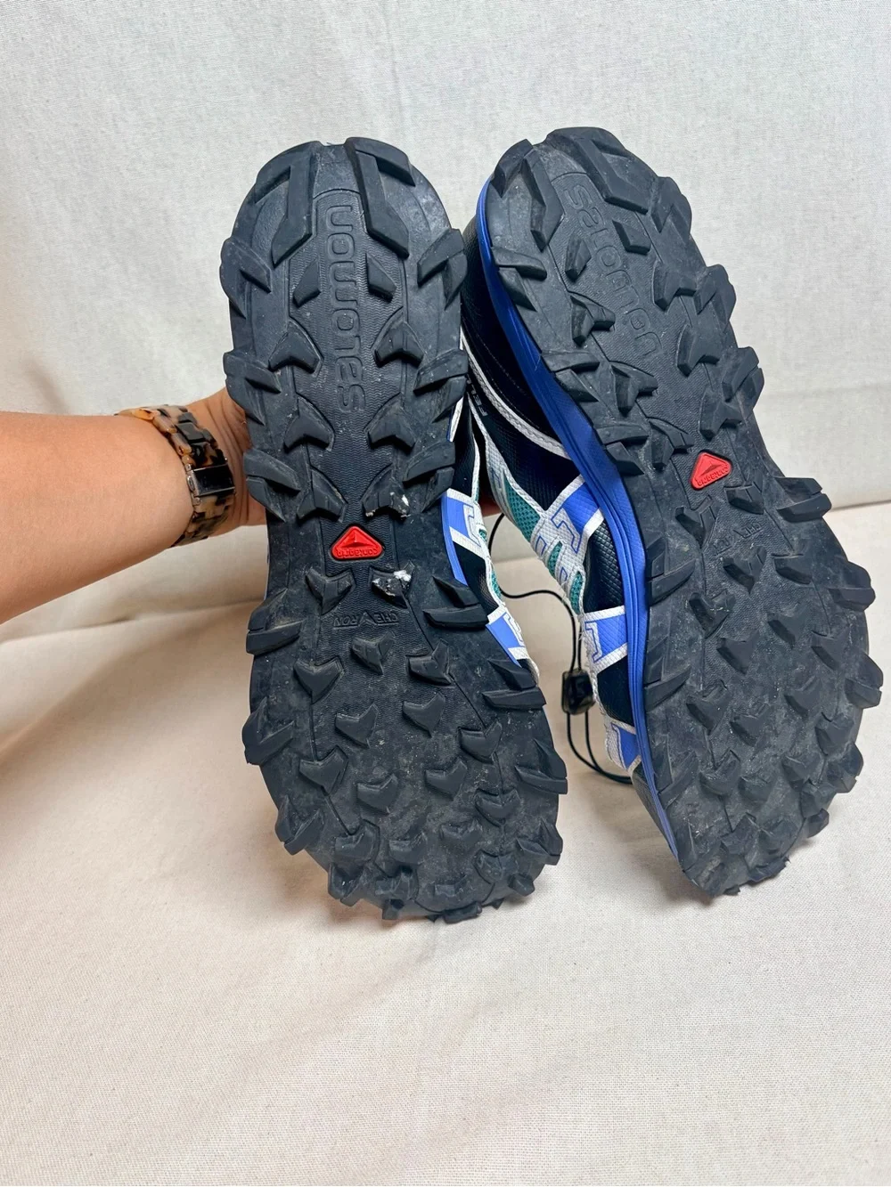 Salomon woman’s Sneakers in Teal, Blue, White and Black size 10